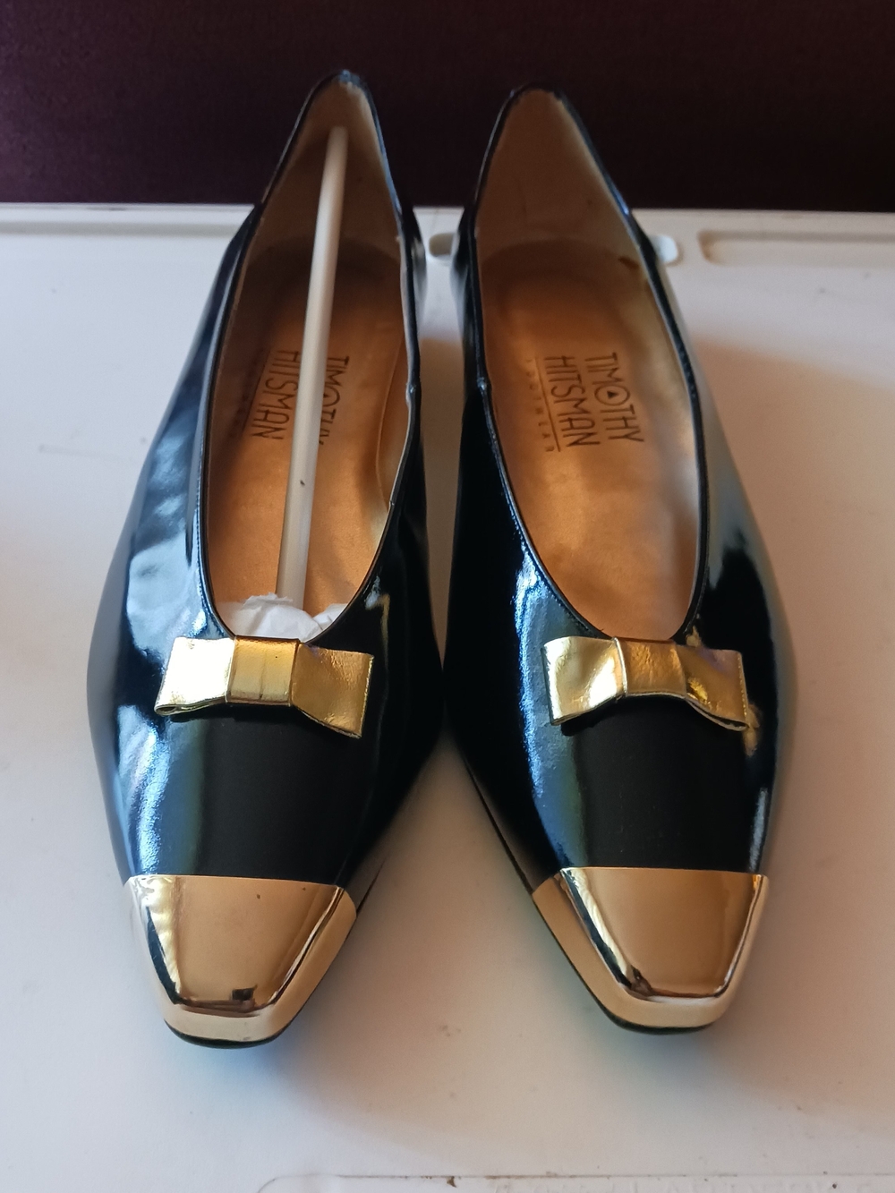 Timothy Hitsman Black Patent Flats with Gold Toe Caps and Bows